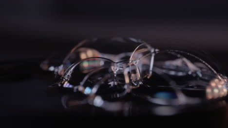 close up view of soap bubbles on wet surface with transparent and moving texture - macro