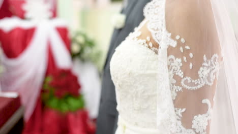 bride and groom at the altar during wedding ceremony