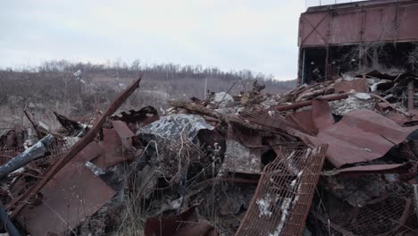 Pan-shot-of-reclaimable-steel-pile-from-an-abandoned-factory