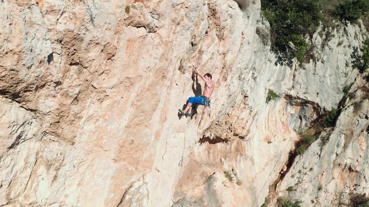 Rock climber climbing the rock 10