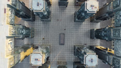 looking down at the patterned square tiles of the chronicle of georgia