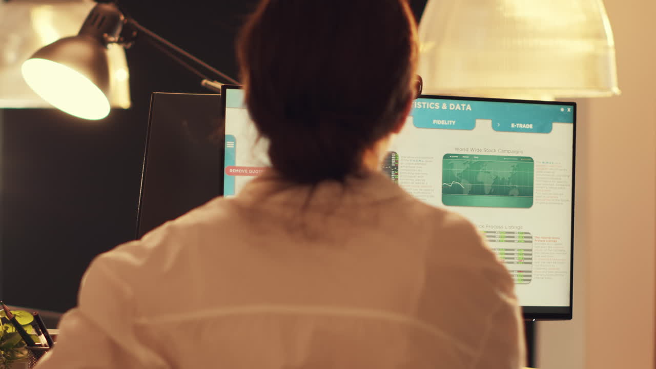 Financial trader looking at stock market real time statistics