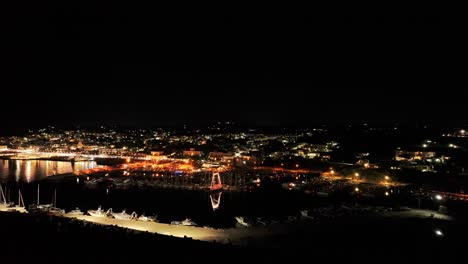 breathtaking 4k drone footage of santa maria di leuca at night, with stunning coastal lights