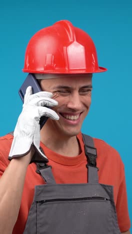 Construction Worker Engaged in a Phone Conversation