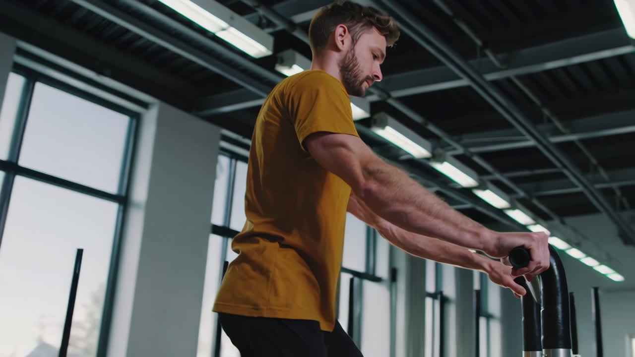 Man Exercising with Gym Equipment