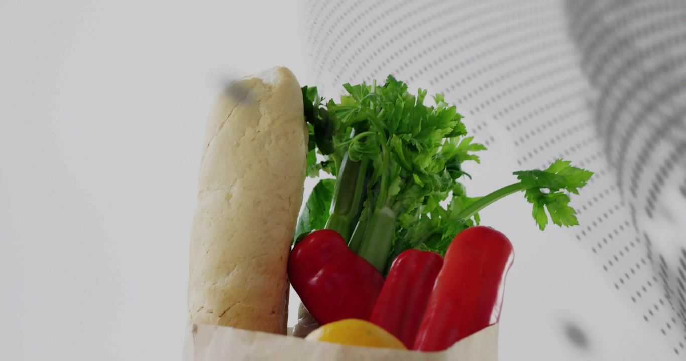 Camera moving revealing paper bag with baguette peppers halftone dots overlaying bag for marketing