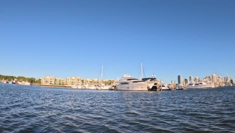 boat cruising near gold coast skyline
