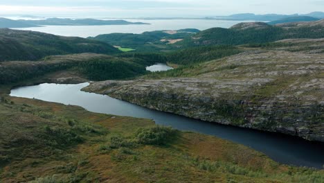 Peaceful-Nature-Scenery-With-Streams-and-Island-Mountains-In-Blaheia,-Norway