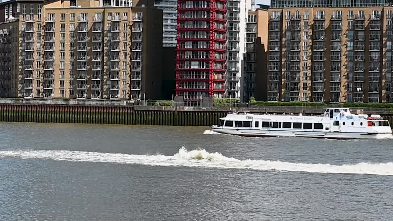 Boats passing each other on the Thames, London, United Kingdom