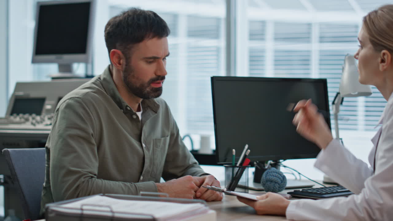 Sick patient complaining health issues closeup. Concerned man visiting doctor