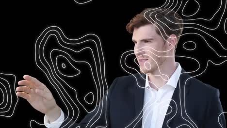 animation of shapes moving over smiling caucasian businessman touching interface