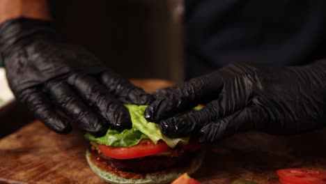 chef preparing a delicious burger