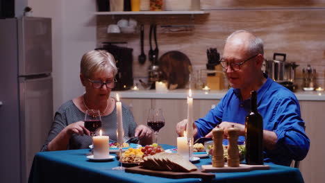 couple with red wine glasses