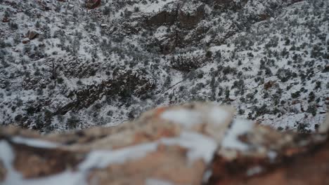 Cinematic-Slow-Motion-Pan-of-Snow-Covered-Canyon