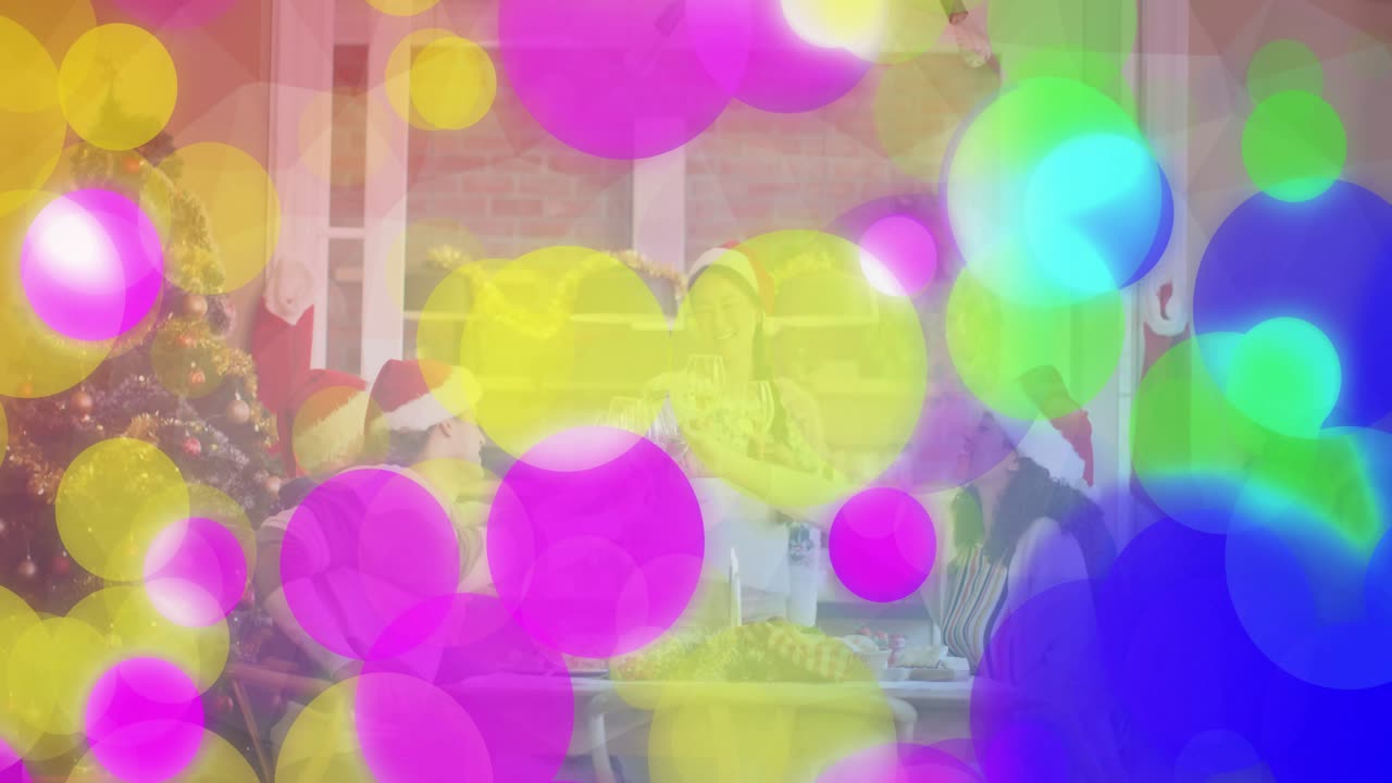 In holiday ad friends raising glasses starting gift reveal activating bokeh, group sampling snacks