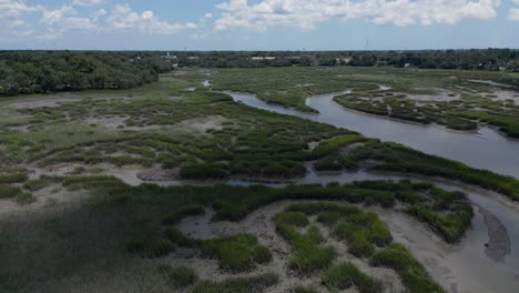 Slow-flyover-of-a-marsh-in-South-Carolina-on-a-sunny,-summer-day