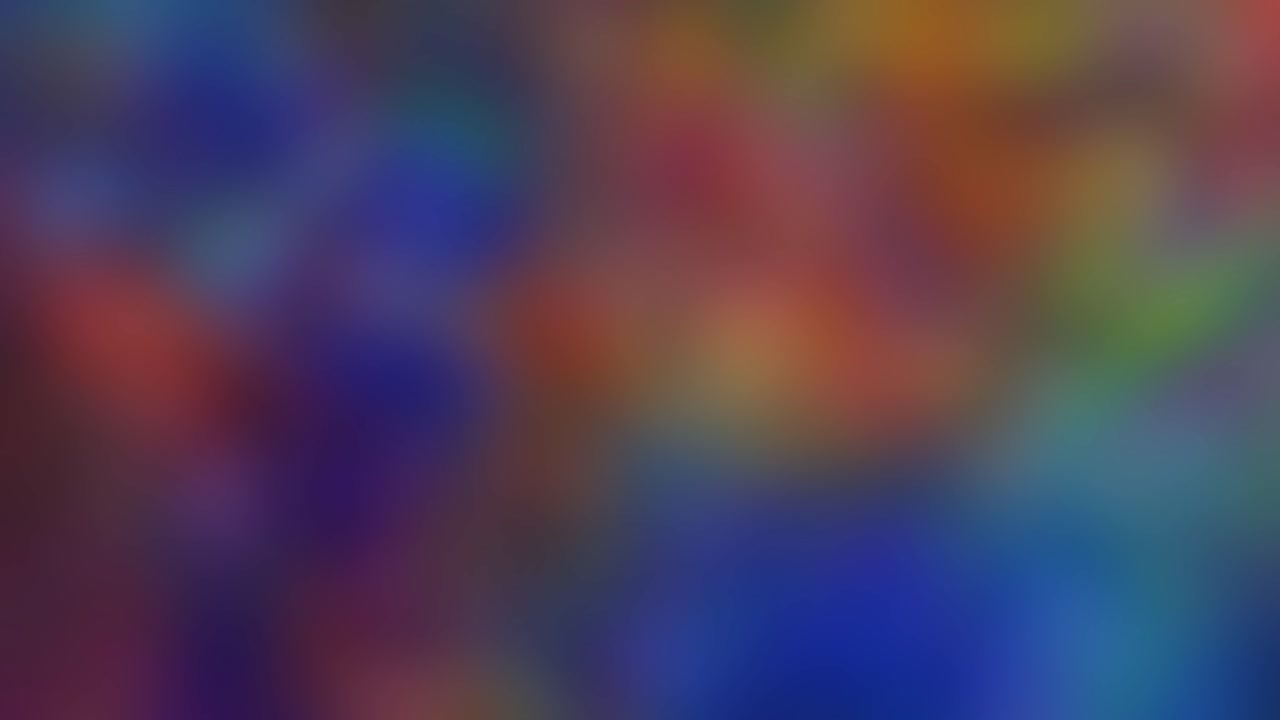 Fondo abstracto borroso, colorido y en bucle que gira, espectro de colores desenfocado en movimiento turbulento