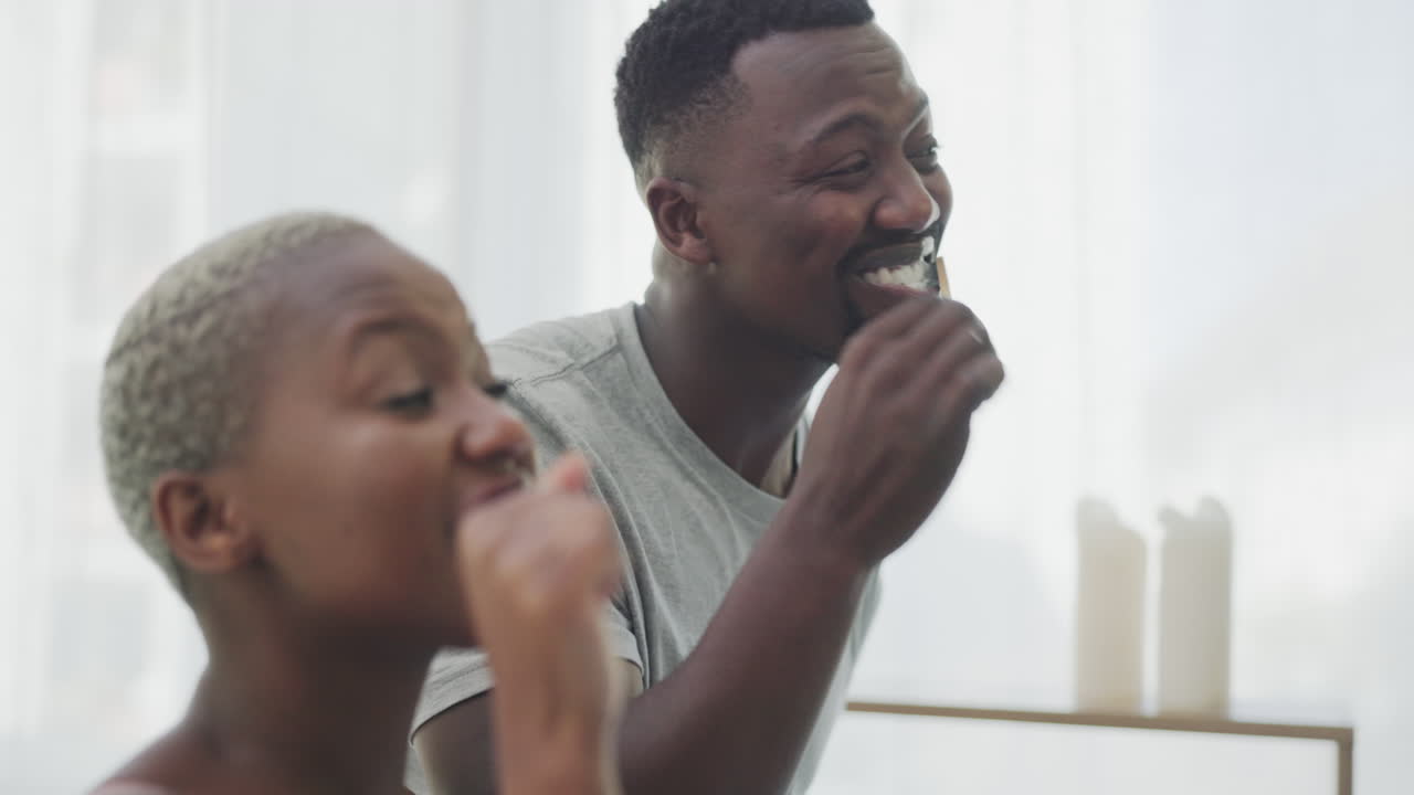 Black couple, brushing teeth
