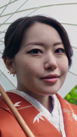 woman in kimono with umbrella