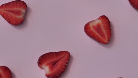 strawberry background motion design video. bio slice fruit berries. color texture close up. 4k 3840x2160