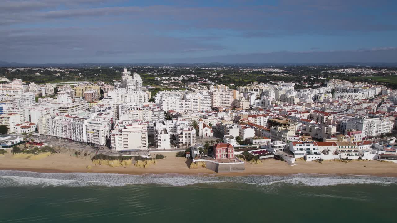 Armação de Pera beach town, Algarve, Portugal - aerial wide view
