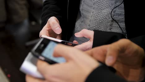 people using smartphones