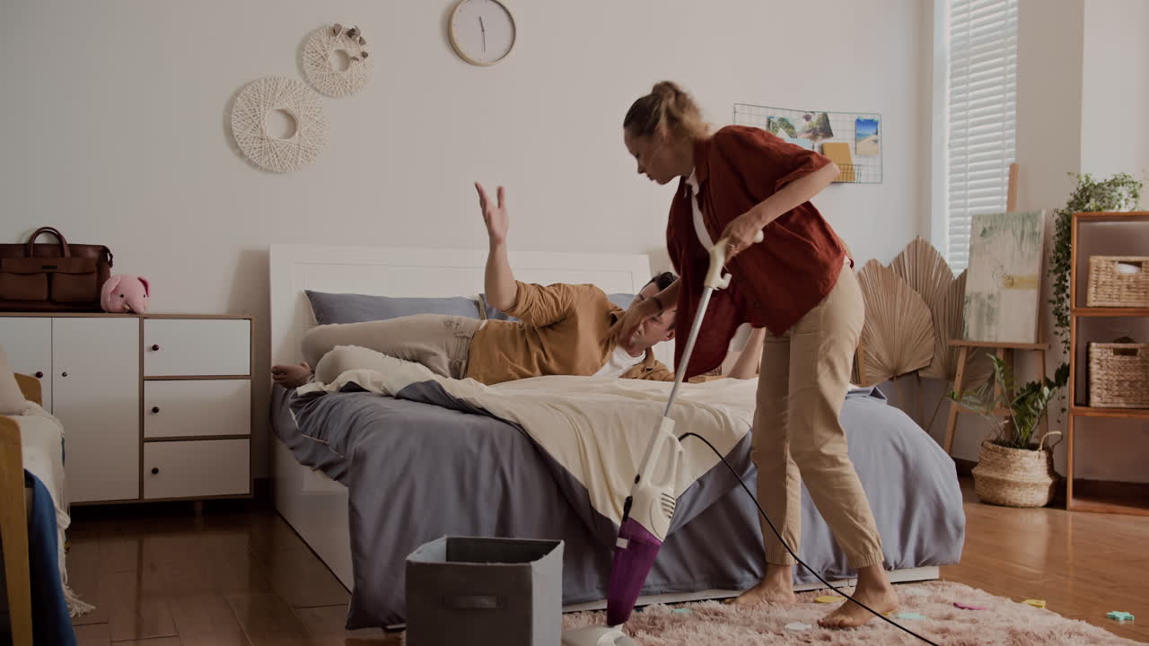 Wife Asking Husband to Help Her with Home Cleaning