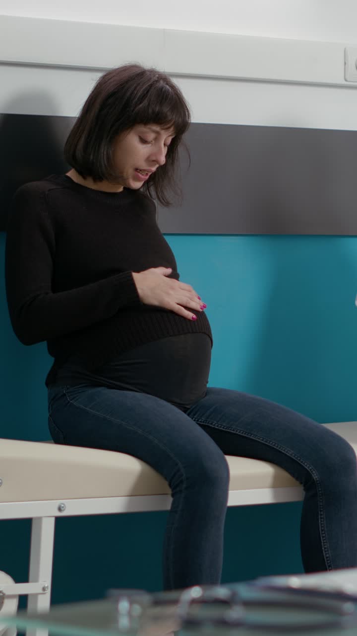 Pregnant woman during a medical consultation with her doctor
