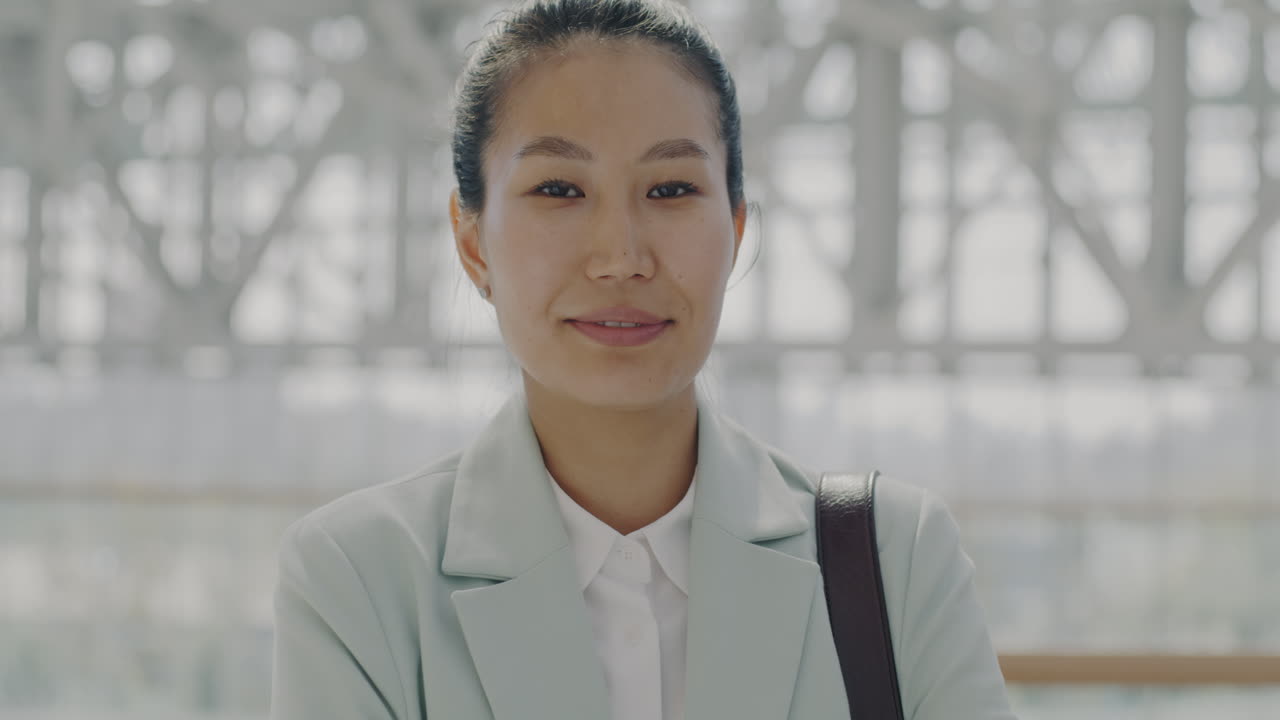 Smiling Businesswoman in Modern Setting