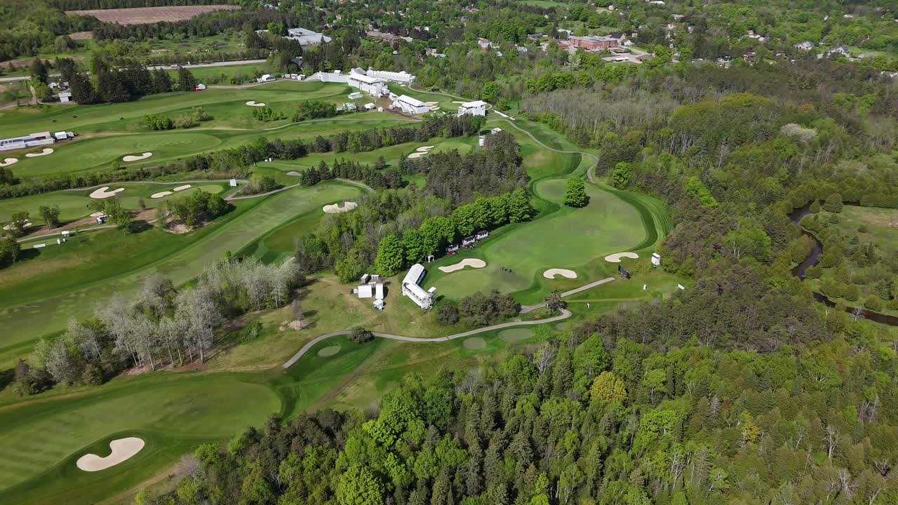 Aerial ascend tilt down over RBC Canadian Open course at Osprey Valley in Caledon, Ontario, Canada