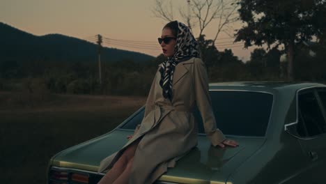 vintage woman on a classic car