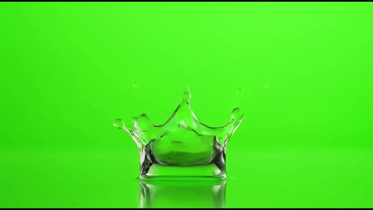 Single Water Drop Falling and Creating a Splash on Green Screen