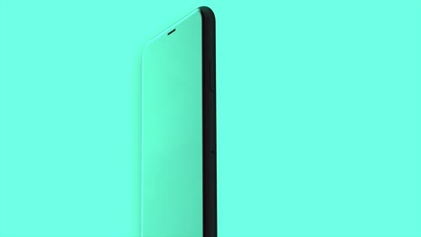 black smartphone on a turquoise background