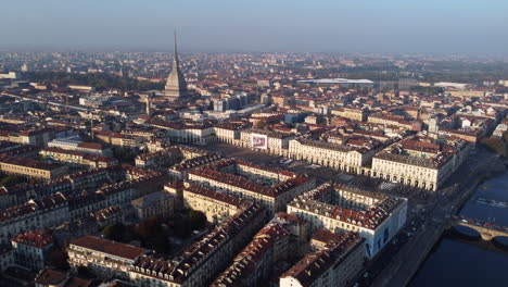 panorama of turin with mole antonelliana at golden hour
