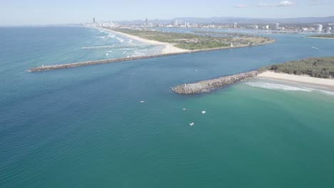 the spit - south stradbroke island and southport - gold coast - qld - queensland - australia - slow pull back aerial shot