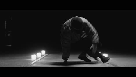 breakdancing performance on train tracks at night