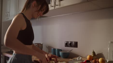 woman preparing breakfast in kitchen