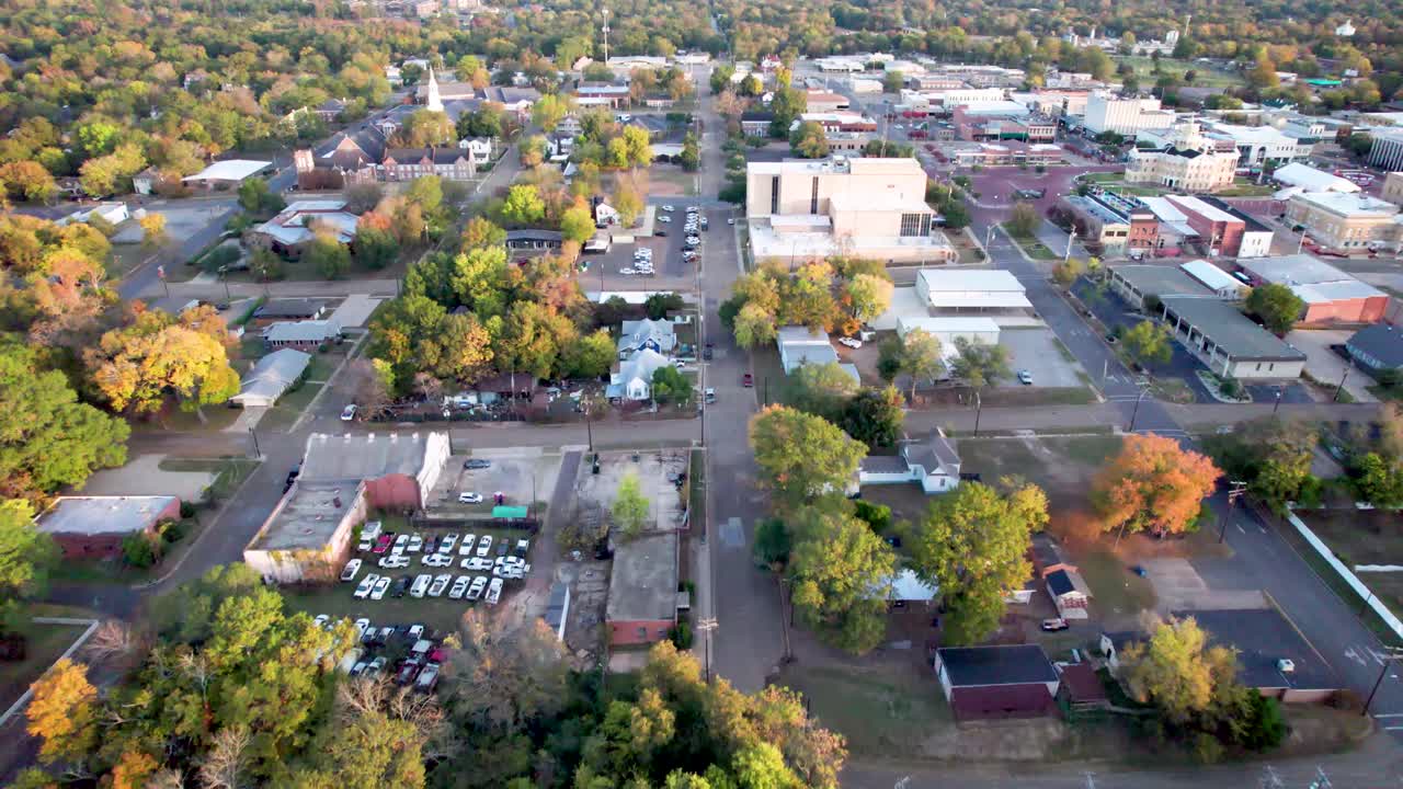 Aerial video of the city of Marshall, Texas, heading north from City Park