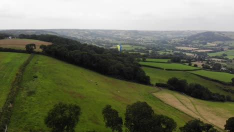 Paragliding-shot-with-a-view-of-the-English-Countryside