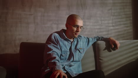 man sitting on a couch