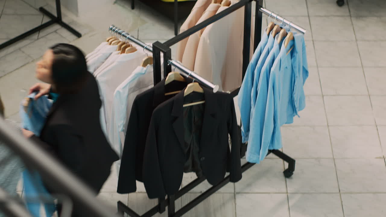 Women shopping for clothes in retail store