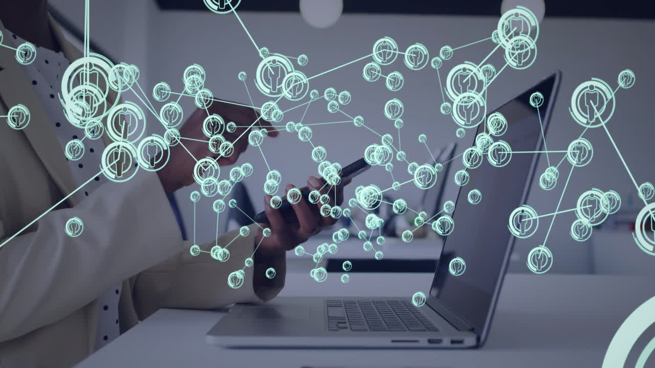Animation of network of connections with icons over american businesswoman using smartphone