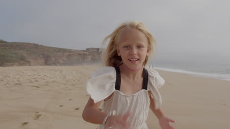 happy girl running on the beach