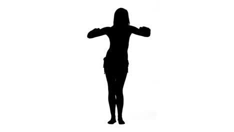 Silhouette-of-woman-doing-exercises-with-hand-weights