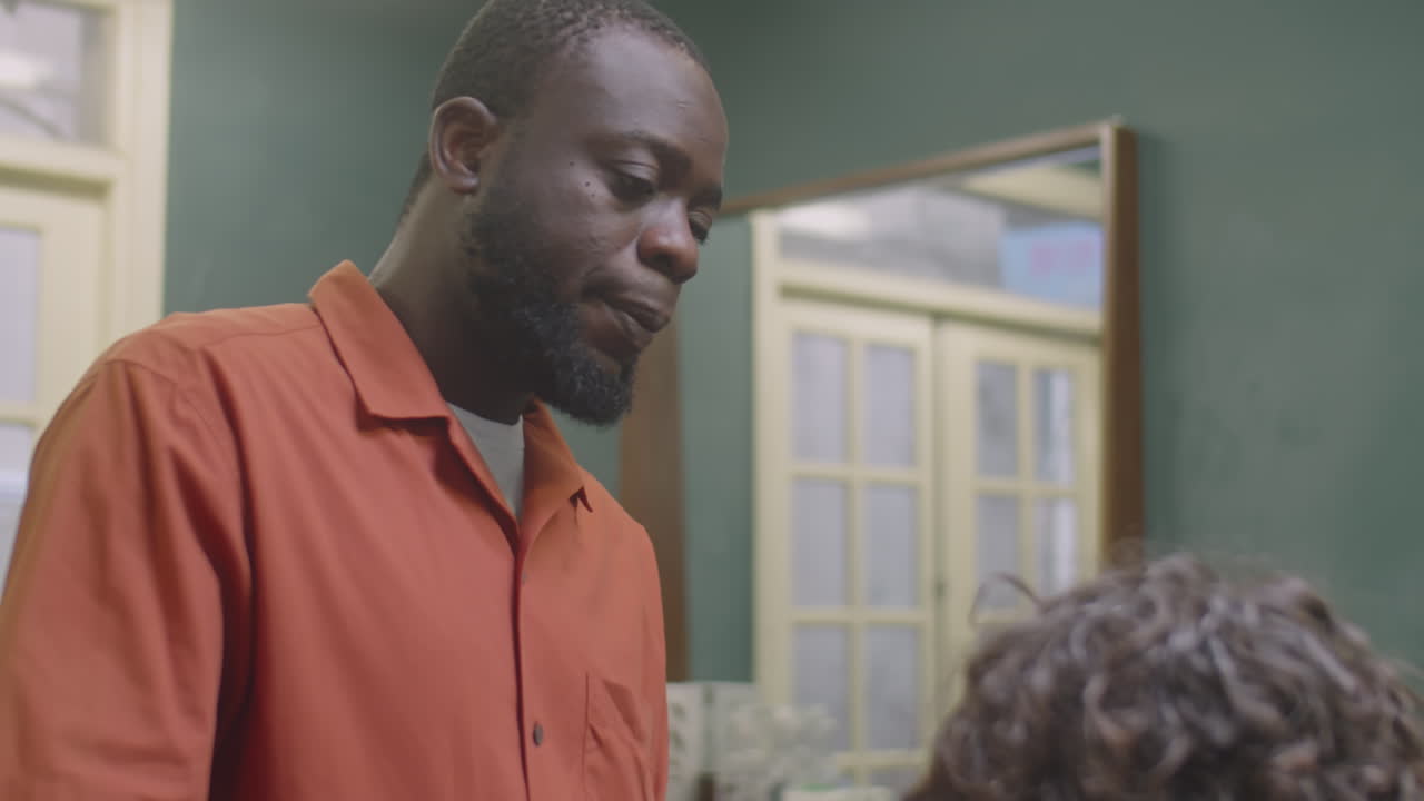 Barber and Client Discussing Haircut