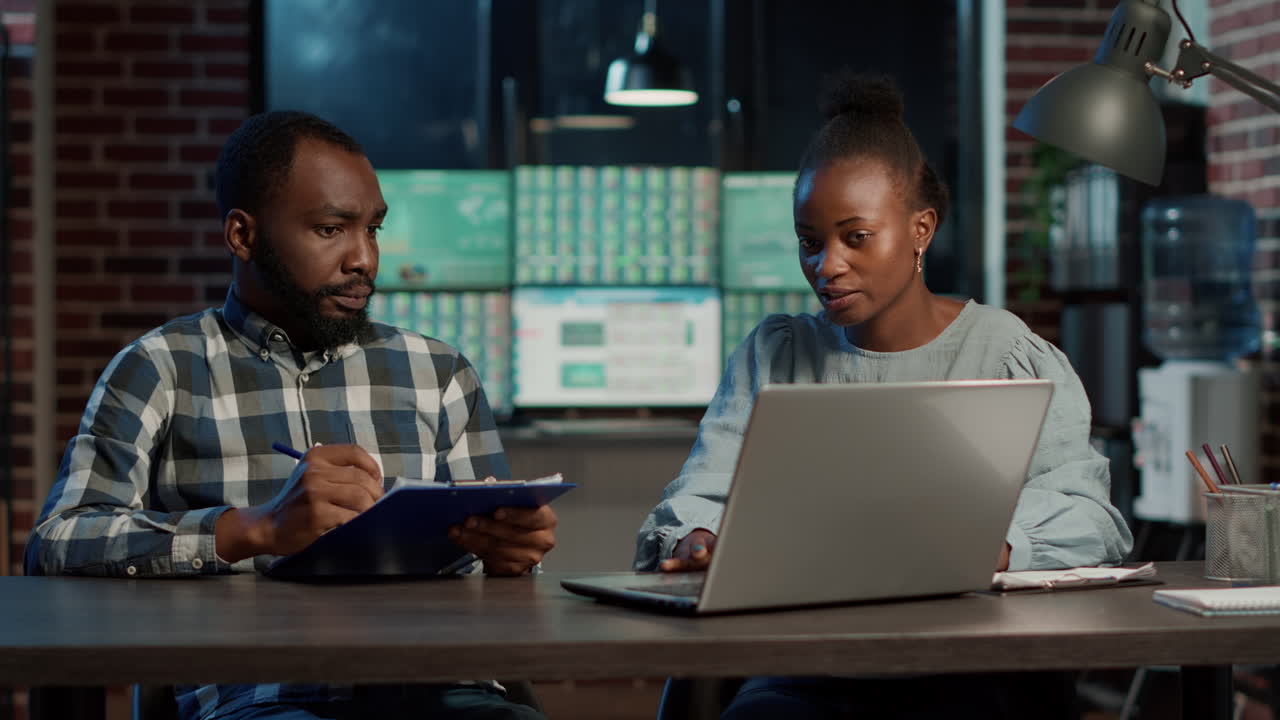 Man and woman doing teamwork to develop new trade sales