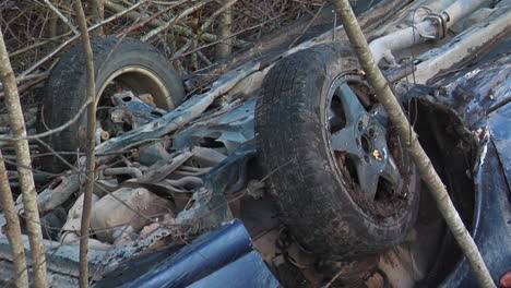 car accident on the slippery roads with black ice turned upside down