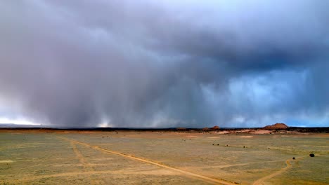 rain falling in desert above phoenix arizona aerial, storm clouds