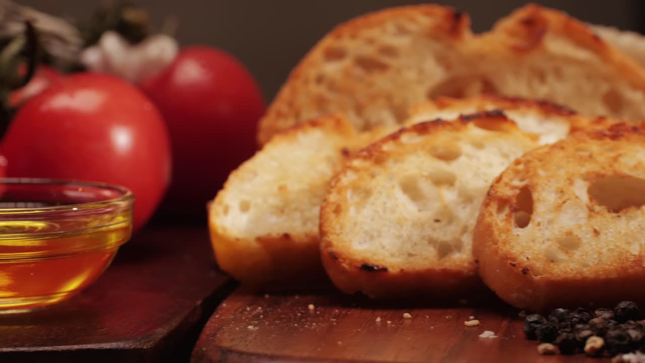 Delicious tapas bread with tomatoes pasta with olive oil close-up, bruschetta with red sauce ketchup, olives dry tomatoes and tasty sandwich bar appetizer, buffet