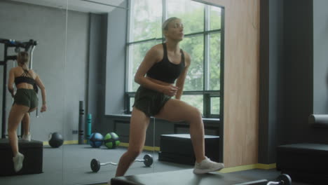 woman training and exercising in a modern gym
